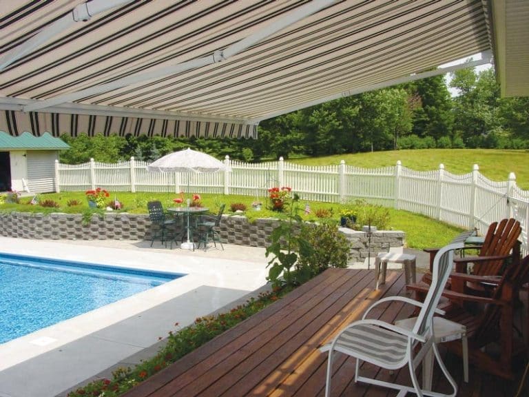 retractable awning next to a pool in northern ohio