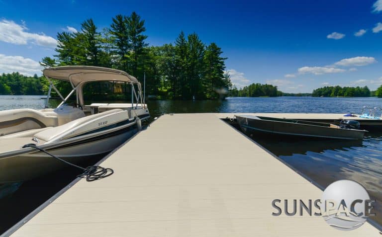 alumadeck decking for a dock next to a body of water